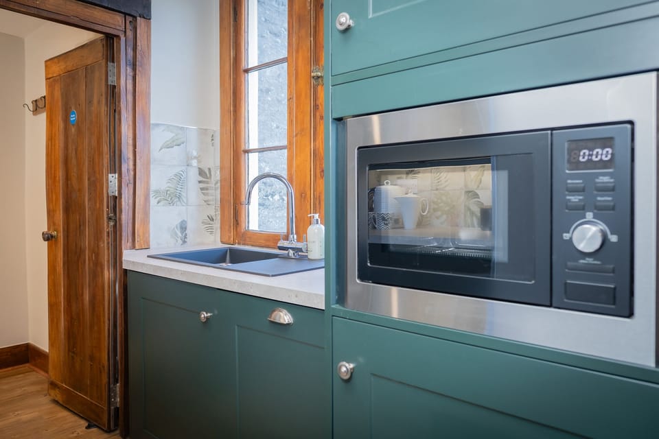 Fridge, electric kettle, toaster, cookware/dishes/utensils