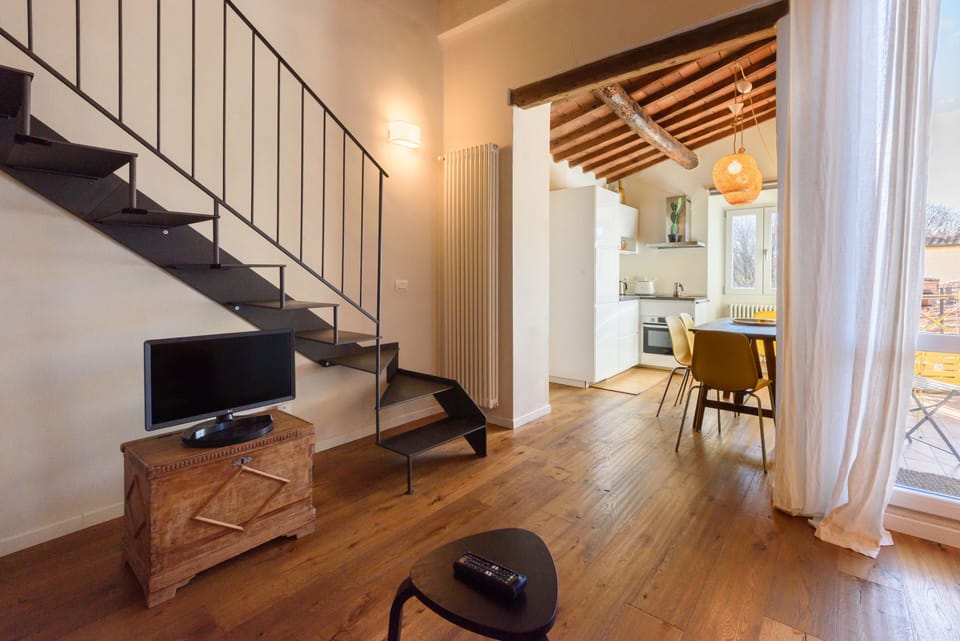Design Apartment | Living area | 40-inch flat-screen TV with digital channels