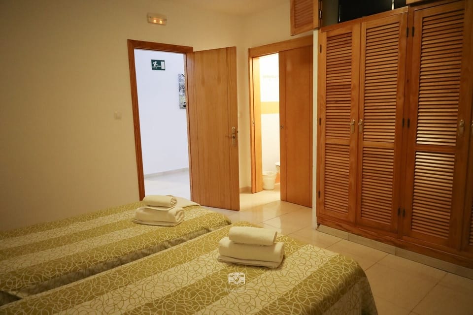 Desk, laptop workspace, WiFi (free), bed sheets