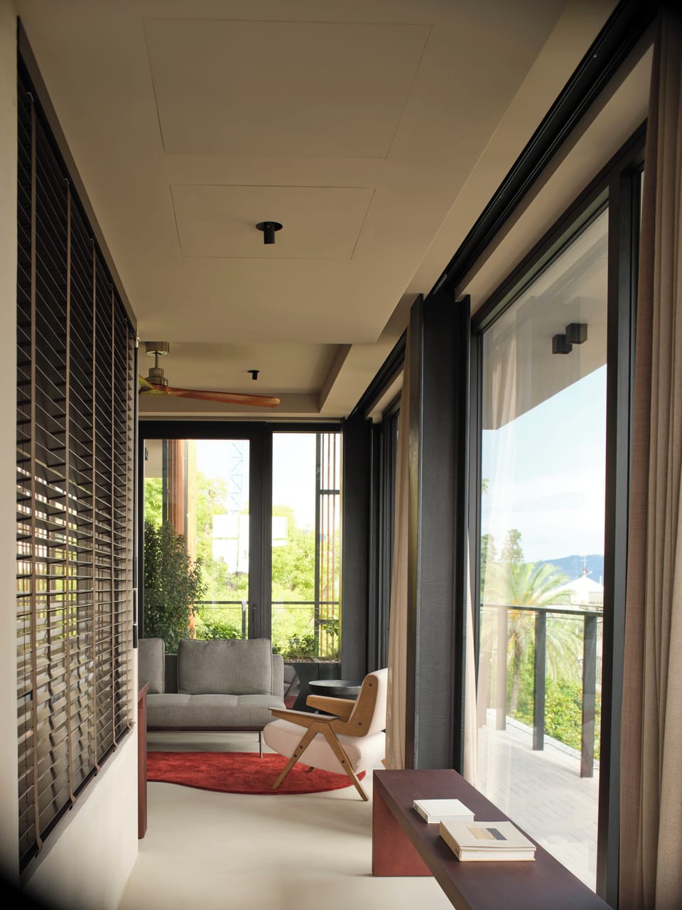 Capitolo Suite, terrace | Living area | 55-inch Smart TV with satellite channels, Netflix, books