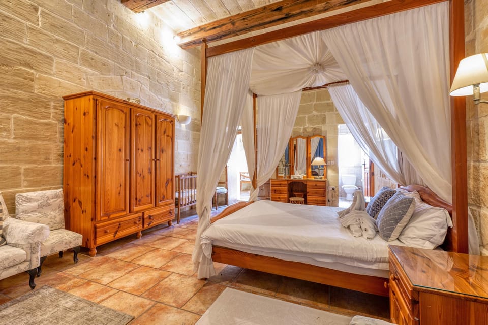 Family Townhome, Multiple Bedrooms (Ta'Leli Pool Farmhouse in Gozo) | 3 bedrooms, iron/ironing board, free WiFi, bed sheets
