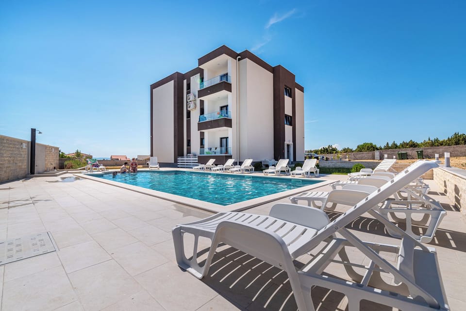 Apartment, 1 Bedroom, Balcony, City View | Pool | Outdoor pool