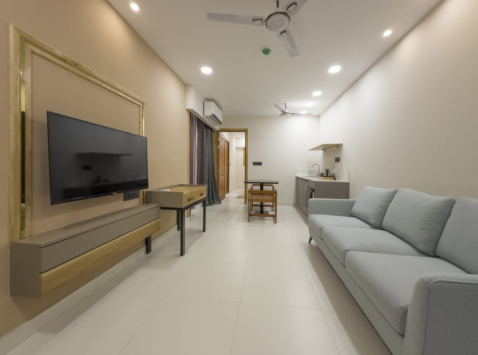 Premium Suite | Living area | 32-inch LED TV with cable channels