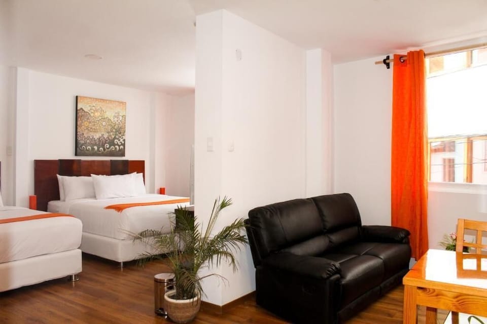 Exclusive Suite, 1 Bedroom | Iron/ironing board, WiFi (free), bed sheets