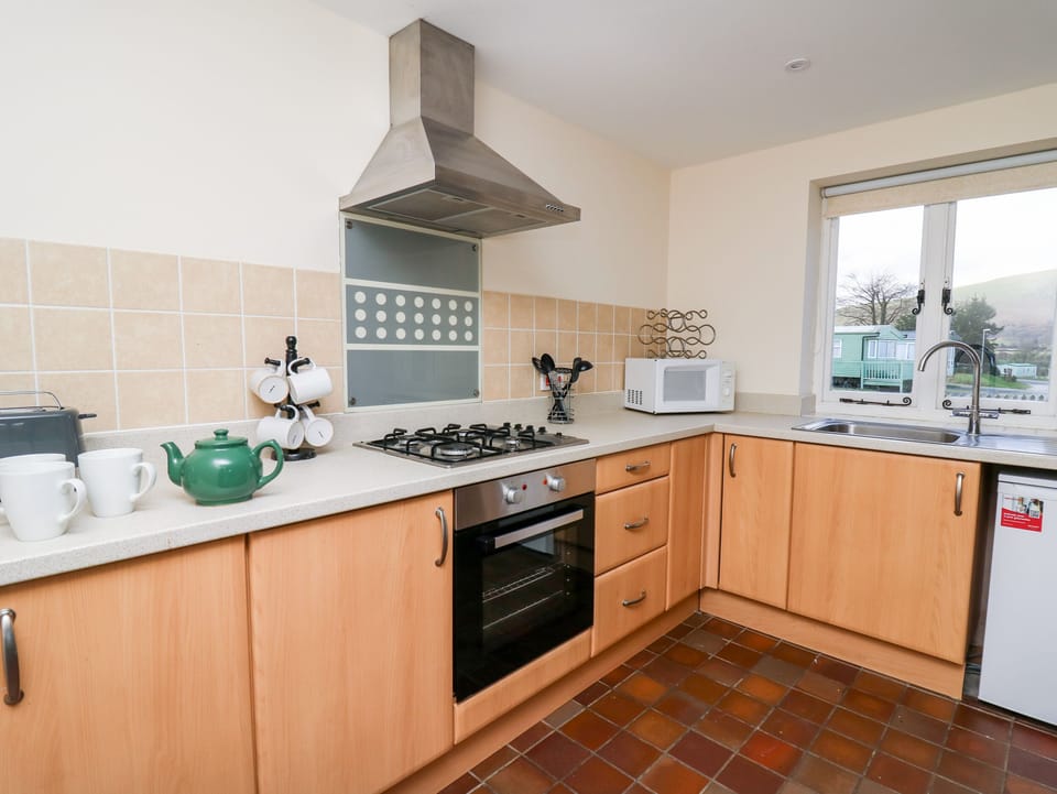 Fridge, electric kettle, toaster, cookware/dishes/utensils