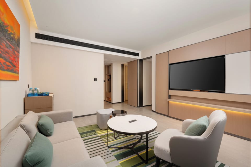 One Bedroom Suite | Down comforters, minibar, desk, laptop workspace