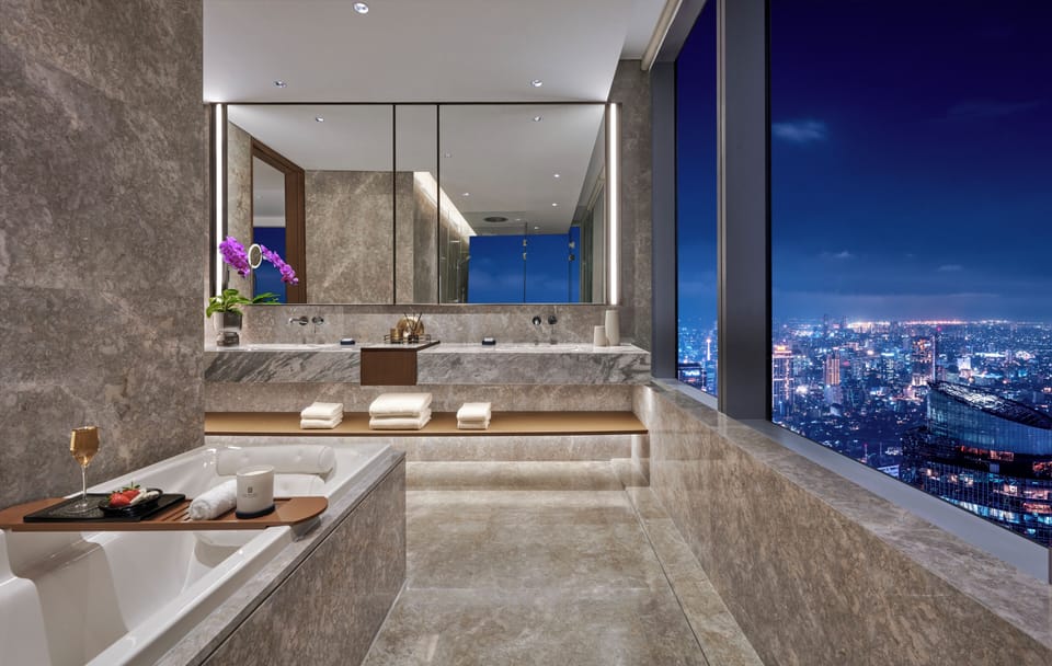 Junior Suite | Bathroom | Designer toiletries, hair dryer, bathrobes, slippers