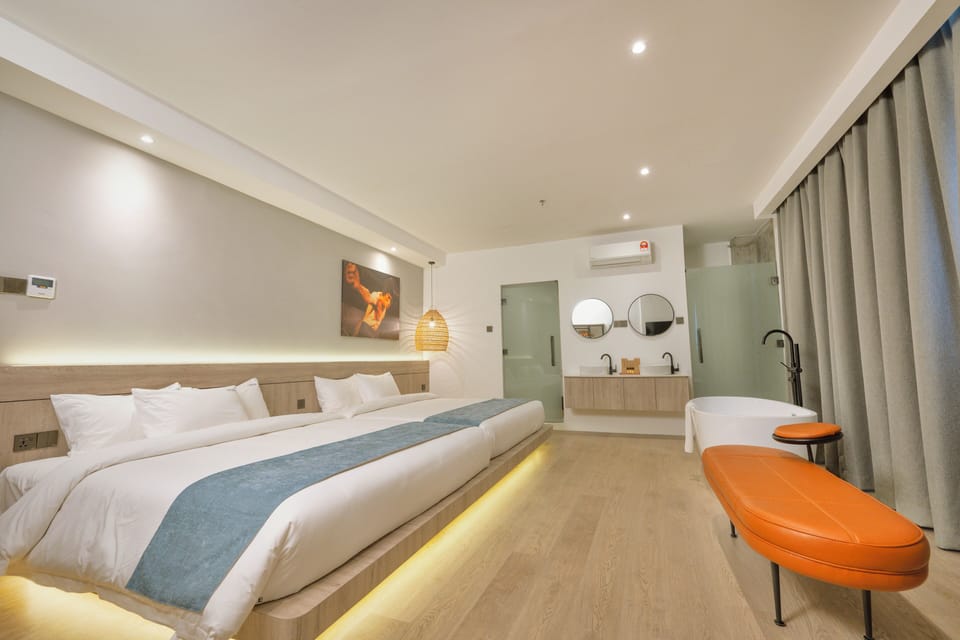 Family Suite | In-room safe, desk, blackout drapes, iron/ironing board