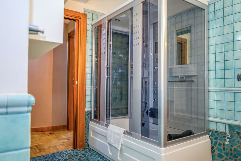 Family Quadruple Room | Bathroom | Shower, hair dryer, bathrobes, bidet