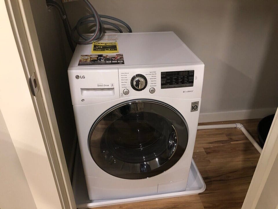 Apartment, Private Bathroom, City View | Laundry room