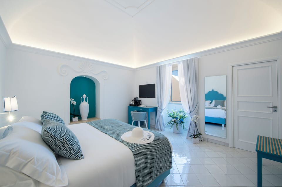 Junior Suite (Punta Reginella) | Premium bedding, down comforters, minibar, in-room safe