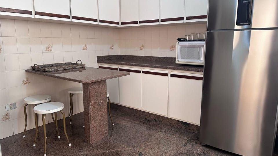 Villa | Private kitchen | Fridge, microwave, cookware/dishes/utensils, freezer