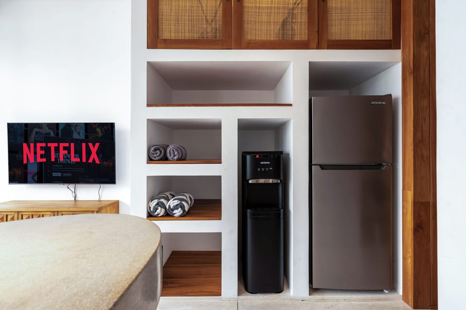 One Bedroom Suite With Balcony | Private kitchen | Fridge, stovetop, electric kettle, toaster