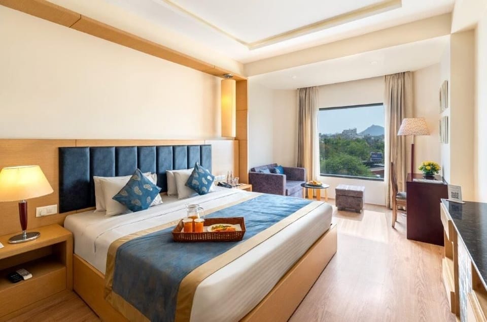 Luxury Suite | Premium bedding, minibar, desk, laptop workspace