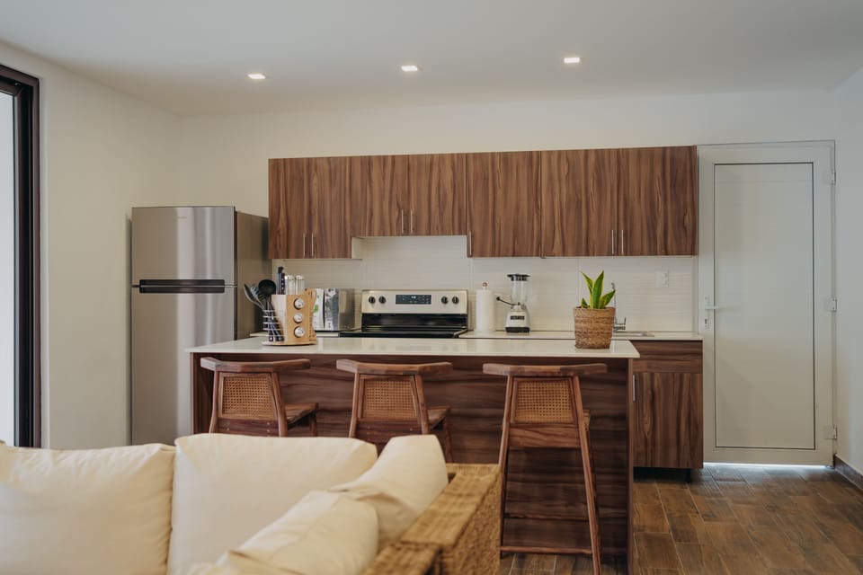 Villa | Private kitchen | Espresso maker, coffee/tea maker, full-size fridge, microwave