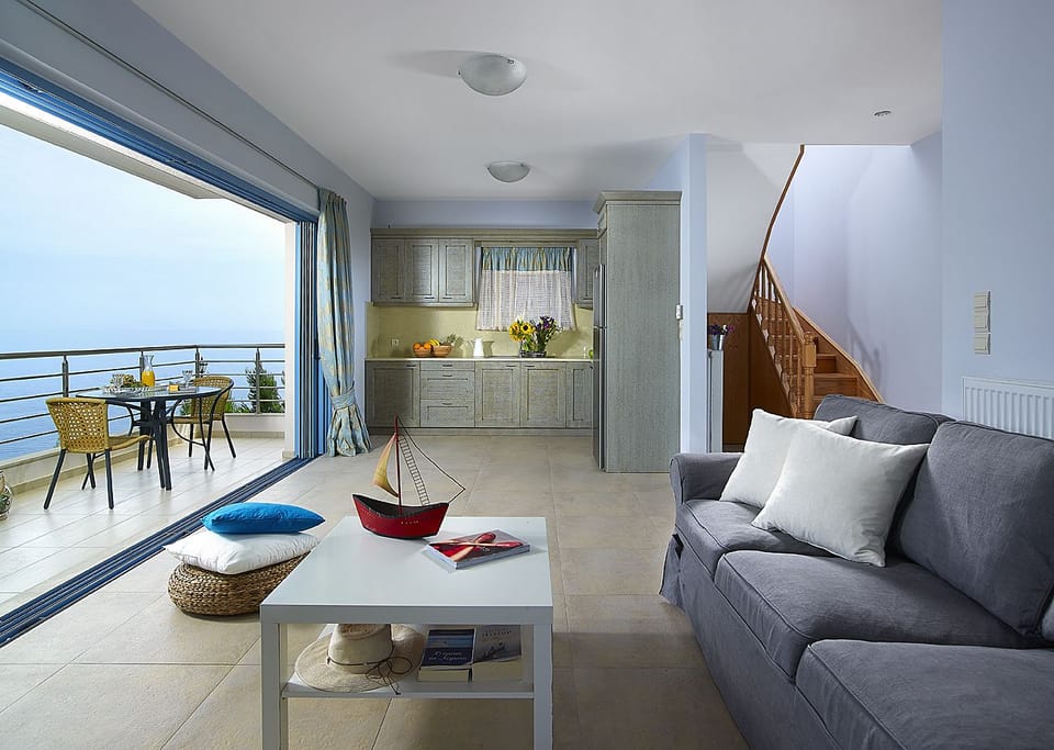 Family Suite, 2 Bedrooms, Sea View | Living room | Flat-screen TV