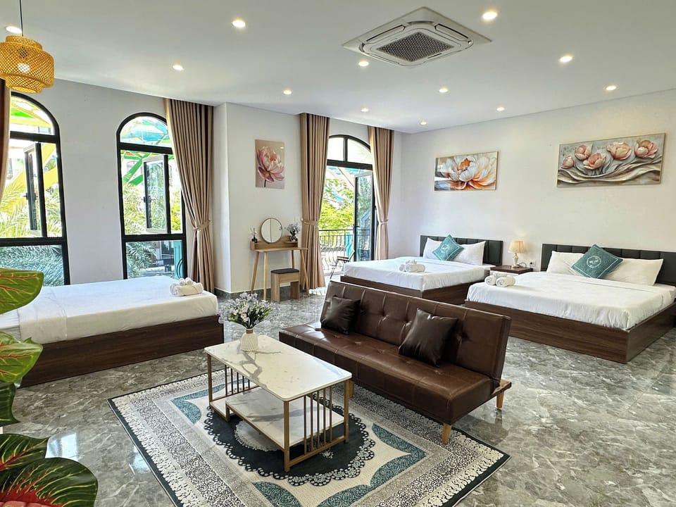 Executive Room, Multiple Beds, Balcony, Beach View | Minibar, desk, soundproofing, free WiFi