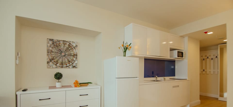 Panoramic Suite with 2 Bedrooms | Private kitchenette | Fridge, microwave, stovetop, electric kettle