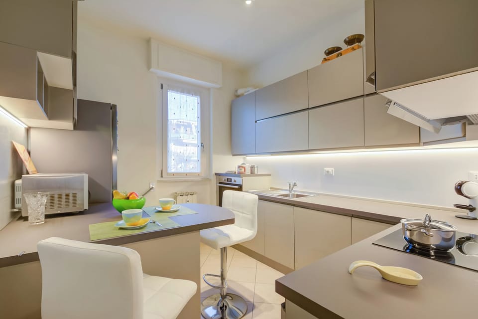 Family Apartment, Multiple Bedrooms (Alelù Classy And Chic Stresa Center) | Private kitchen | Fridge, microwave, oven, stovetop