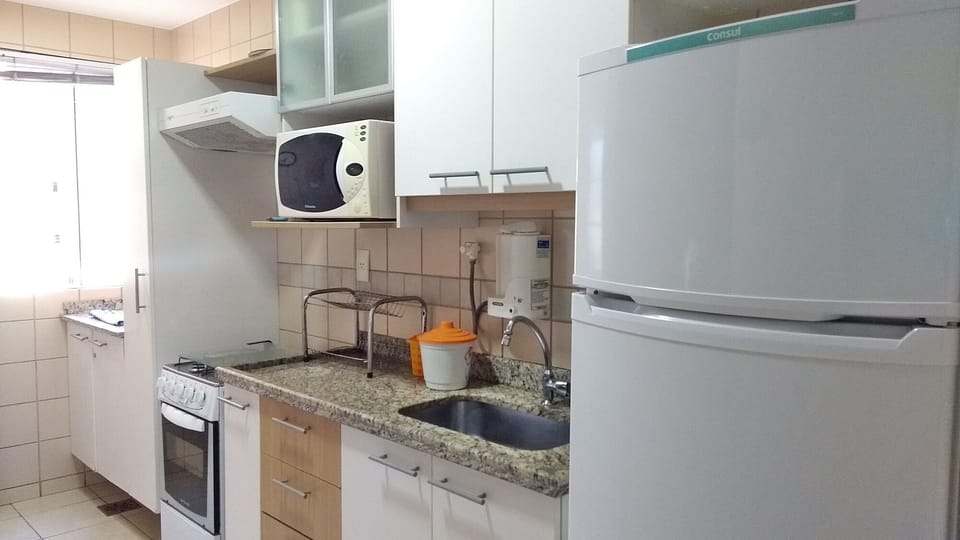 Apartment | Private kitchen | Fridge, microwave, cookware/dishes/utensils, dining table