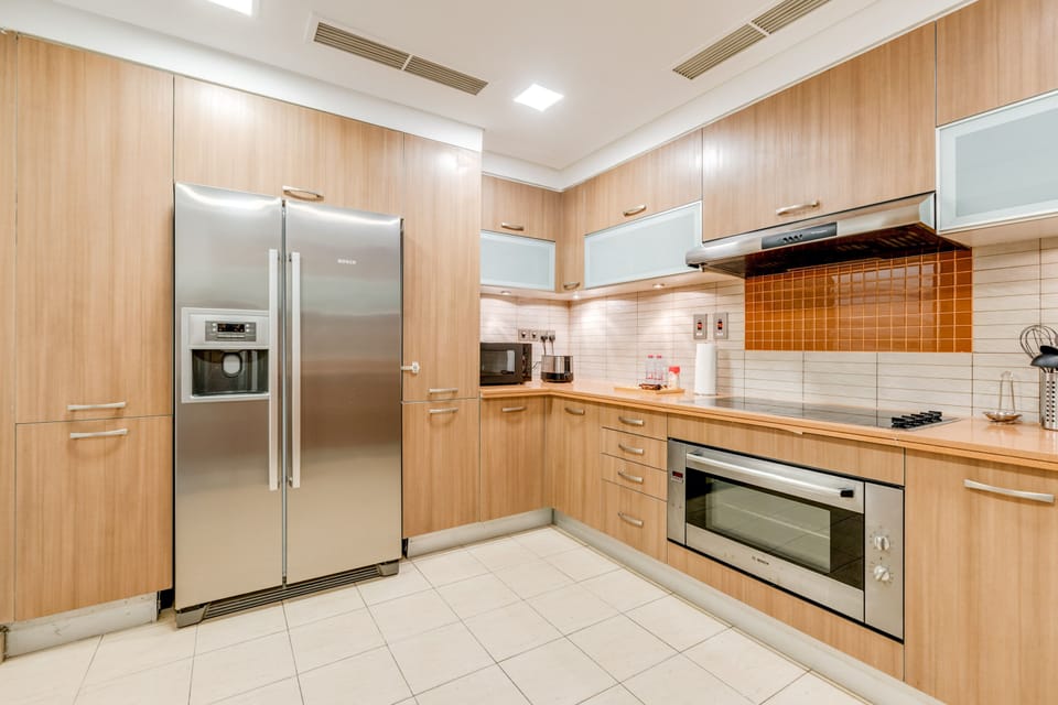 Luxury Townhome, 3 Bedrooms, Sea View | Private kitchen | Coffee/tea maker, full-size fridge, microwave, oven