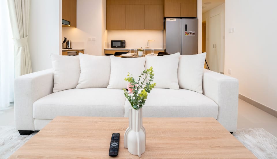 Deluxe Apartment | Living area | 55-inch Smart TV with digital channels