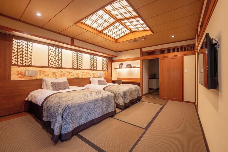 Premium Suite, Non Smoking, Garden View | 1 bedroom, premium bedding, down comforters, minibar