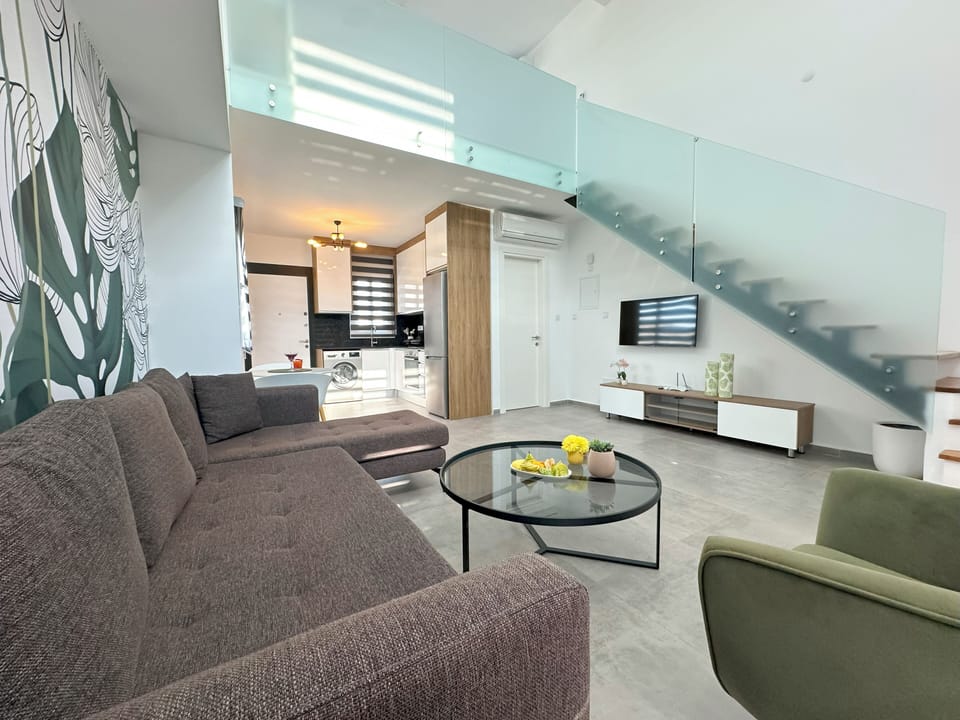 Loft | Living area | 82-cm Smart TV with satellite channels
