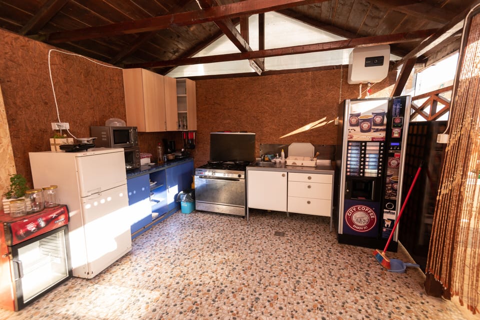 Family Room | Shared kitchen | Mini-fridge, highchair, paper towels