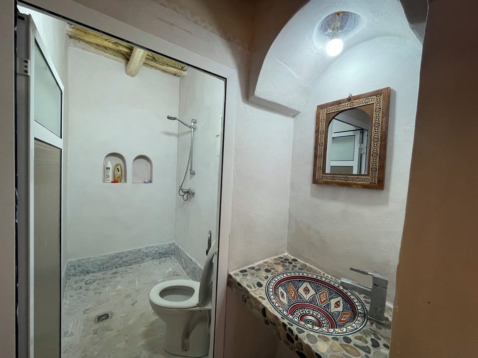 Shower, free toiletries, hair dryer, bathrobes