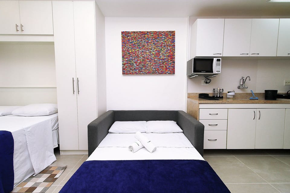Comfort Quadruple Room | Premium bedding, blackout drapes, free WiFi, bed sheets