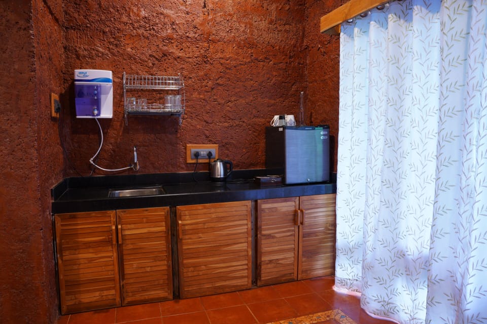 Premium Cottage | Living area | 32-inch LED TV with satellite channels