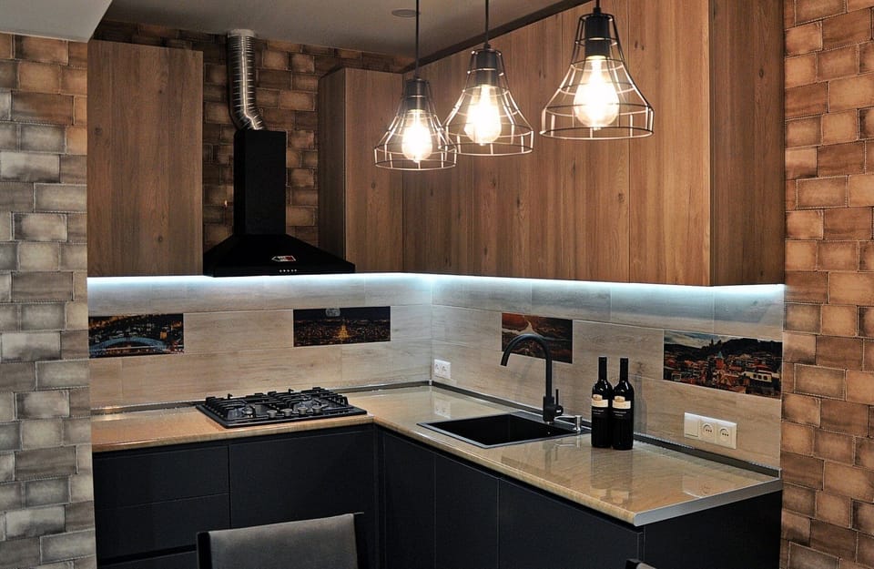 Deluxe Apartment, 4 Bedrooms | Private kitchen | Full-size fridge, microwave, stovetop, electric kettle