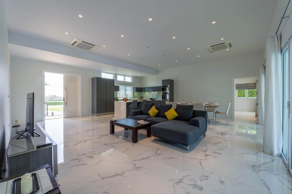 Exclusive Villa | Living area | 40-inch TV with digital channels