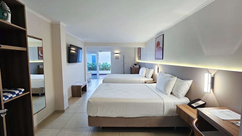 Standard Room, 2 Double Beds, Non Smoking, Pool View | In-room safe, desk, blackout drapes, iron/ironing board