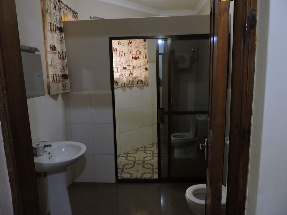 Basic Double Room | Bathroom | Free toiletries, slippers