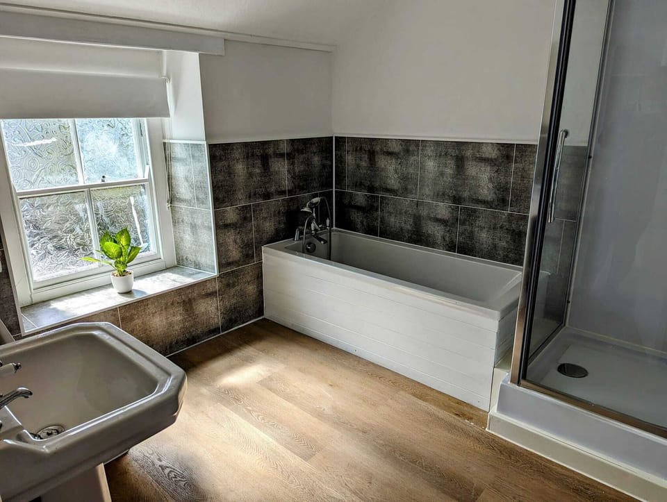 Deluxe Double Room | Bathroom | Separate tub and shower, hair dryer, towels, soap