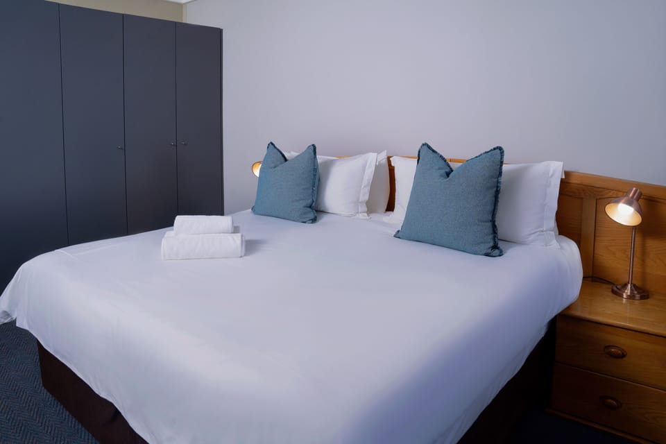 Standard Suite | In-room safe, desk, laptop workspace, blackout drapes