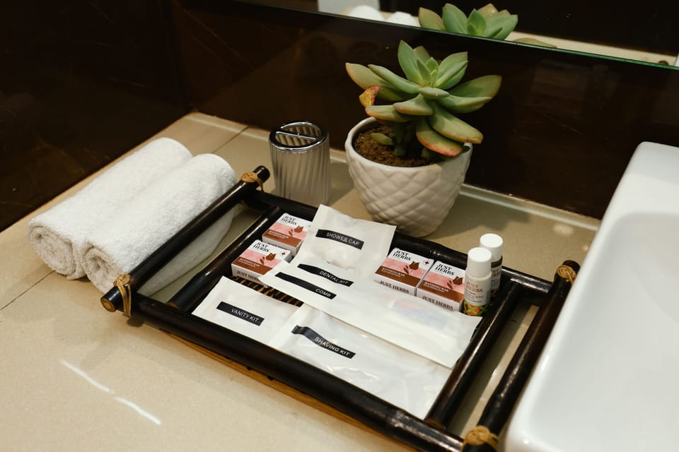 Family Quadruple Room | Bathroom amenities | Shower, rainfall showerhead, hair dryer, towels