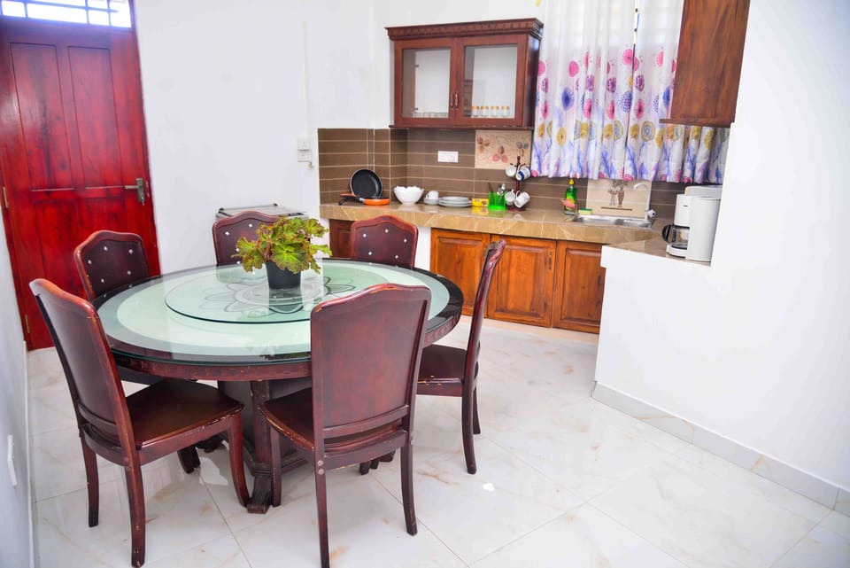 Deluxe Apartment | Private kitchen | Full-size fridge, microwave, oven, toaster