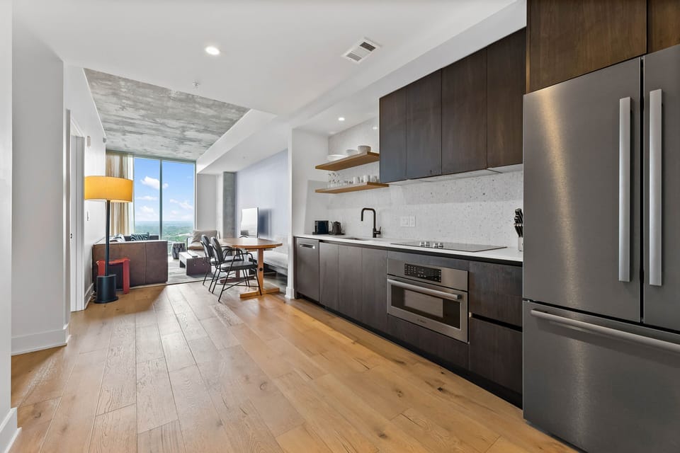 Luxury Condo, 1 King Bed with Sofa bed, Balcony, City View | Private kitchen | Full-size fridge, microwave, oven, stovetop
