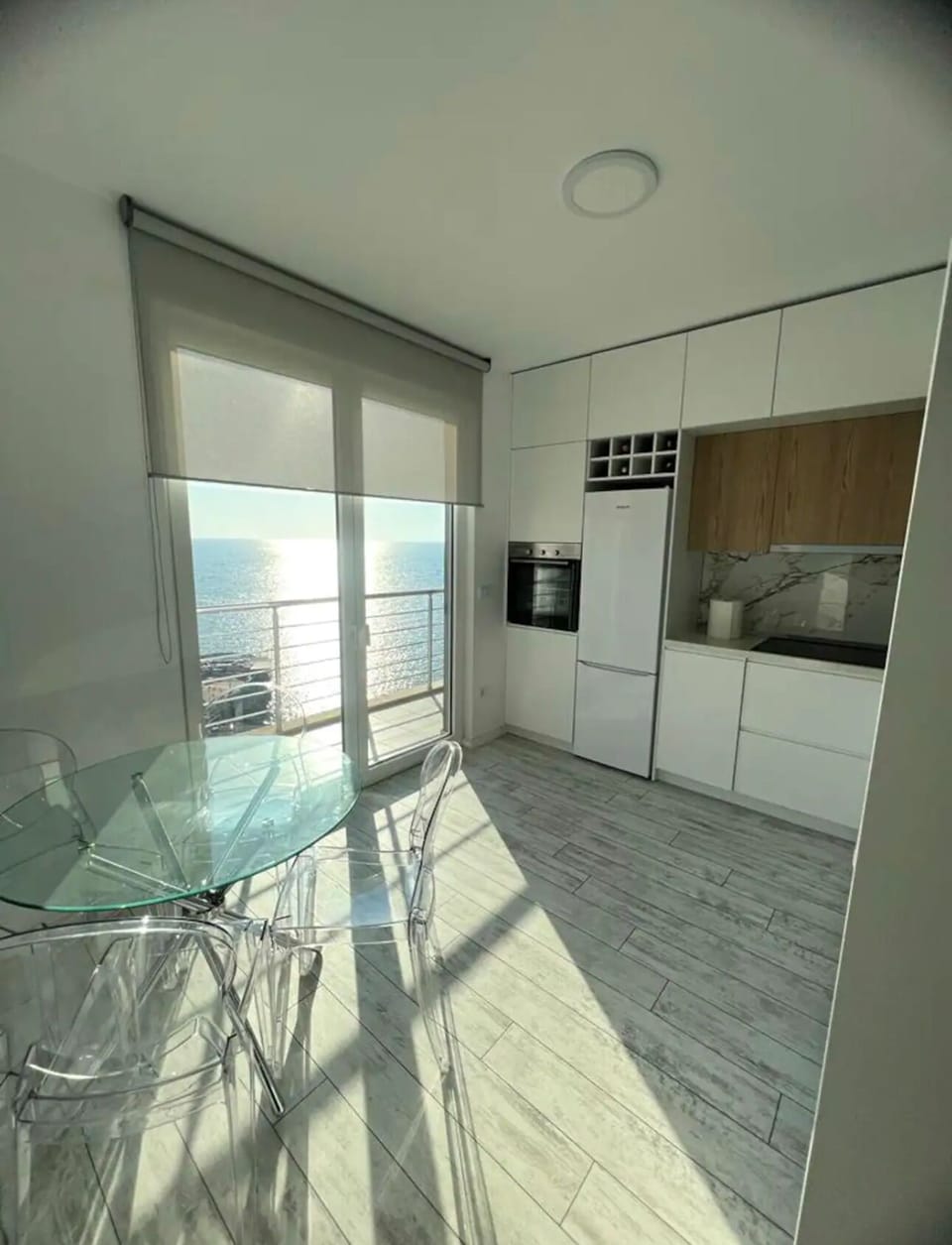Panoramic Apartment | Private kitchen | Full-size fridge, electric kettle, cookware/dishes/utensils