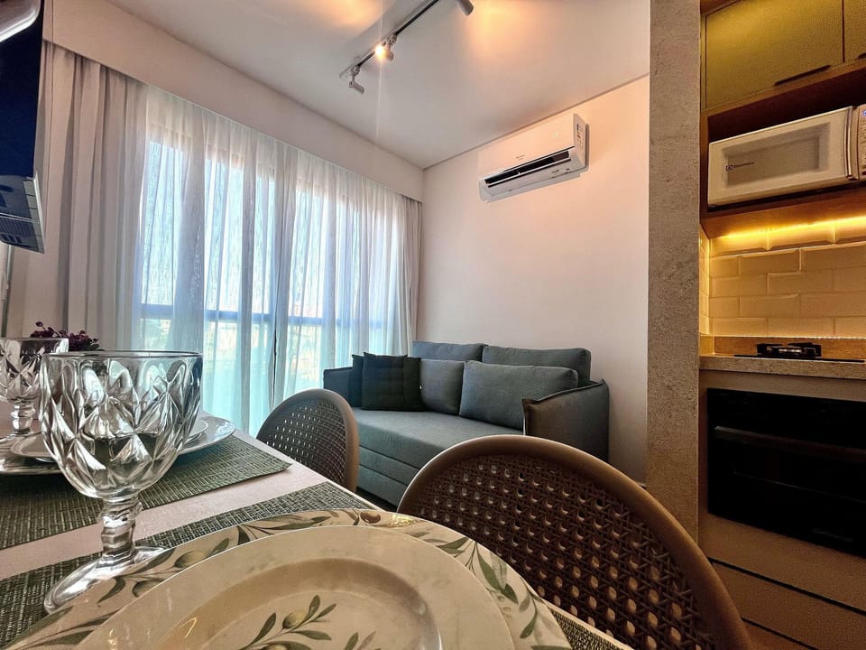 Apartment | Living area | 32-inch Smart TV with cable channels
