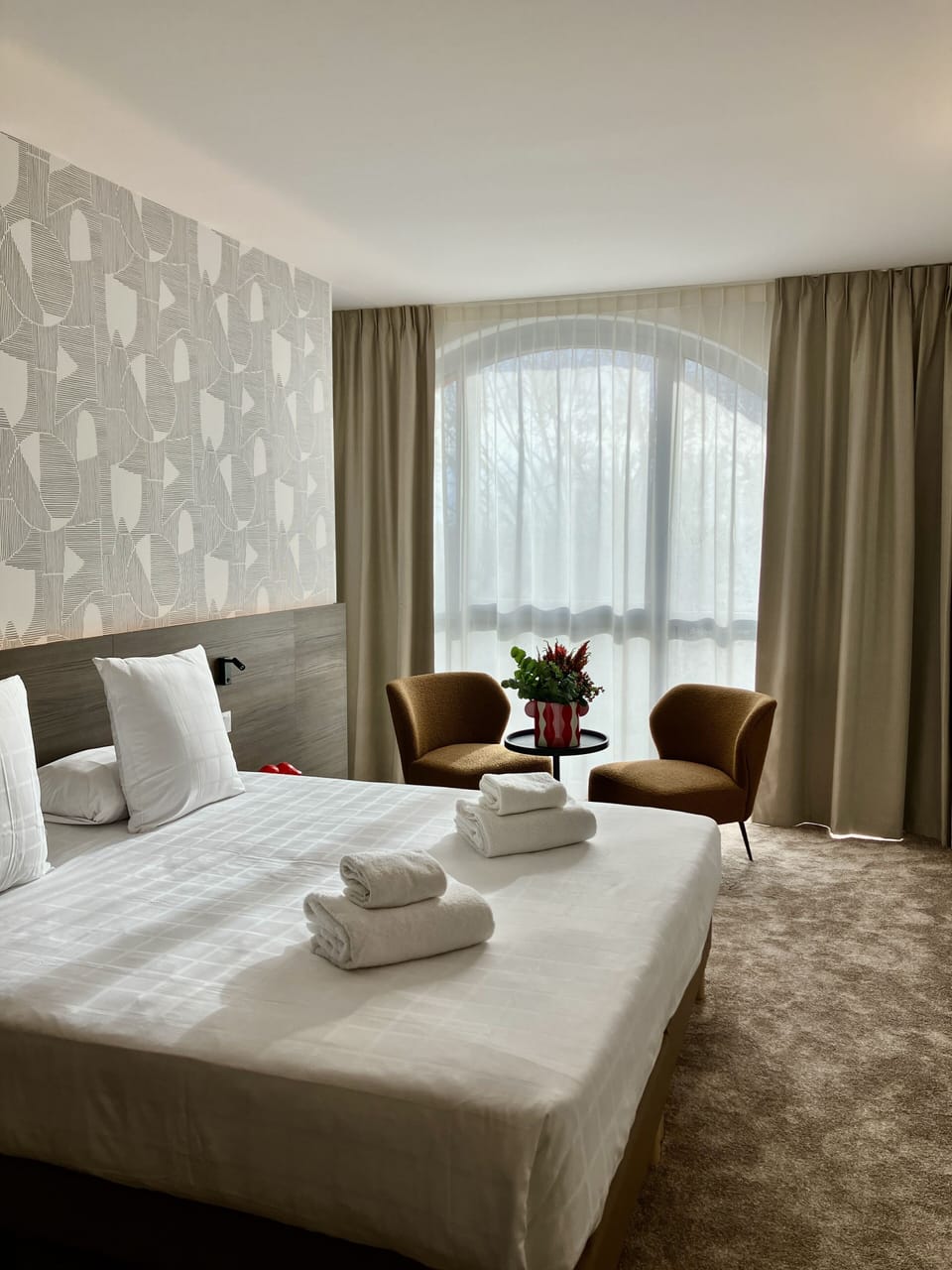 Premium bedding, memory foam beds, in-room safe, laptop workspace