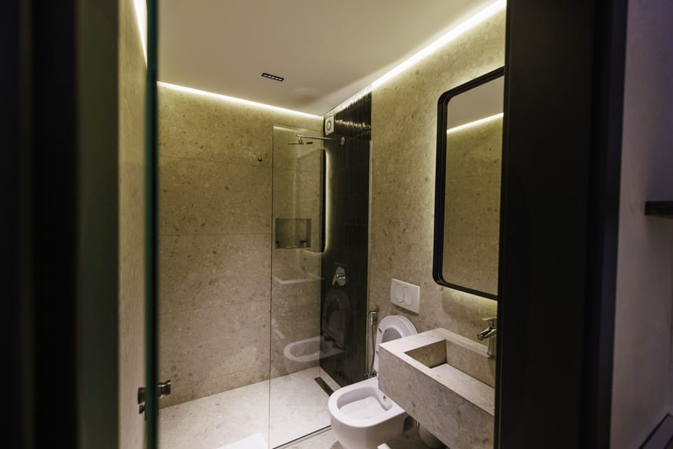 Shower, free toiletries, hair dryer, slippers