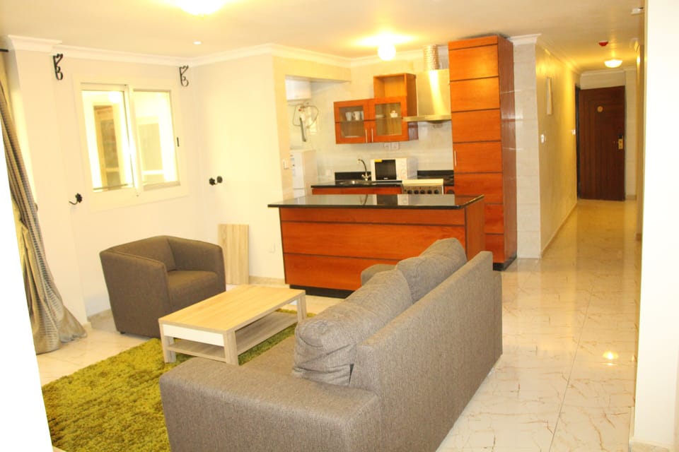Deluxe Apartment | Living area | Flat-screen TV