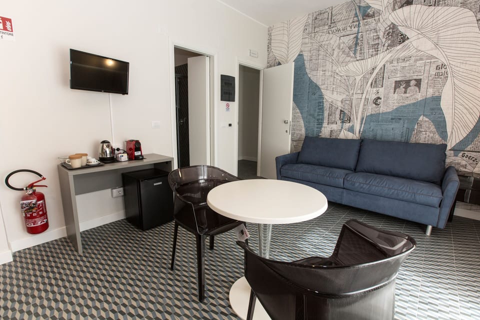 Family Room | 1 bedroom, in-room safe, individually furnished, desk
