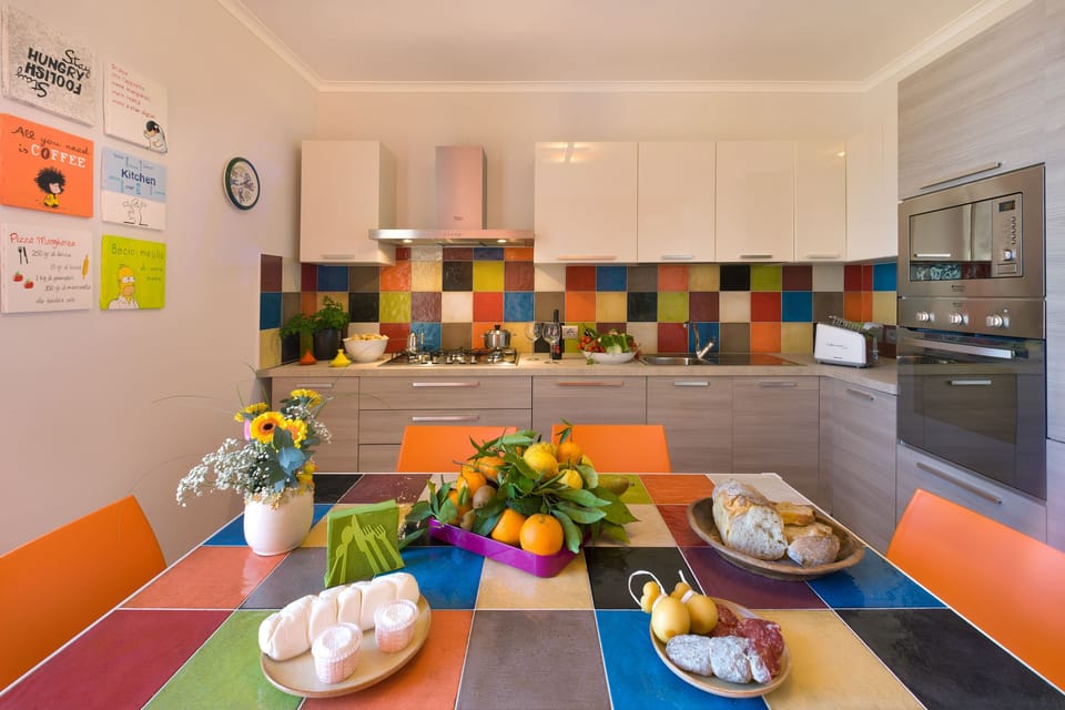 Deluxe Apartment, Terrace, Sea View | Private kitchen | Fridge, microwave, oven, stovetop