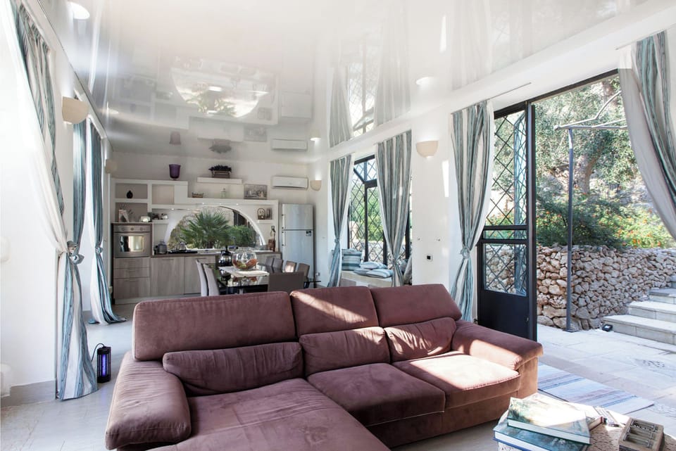 Family Villa, 4 Bedrooms, Terrace (Tenuta Bouganville With Garden And) | Living area | Flat-screen TV