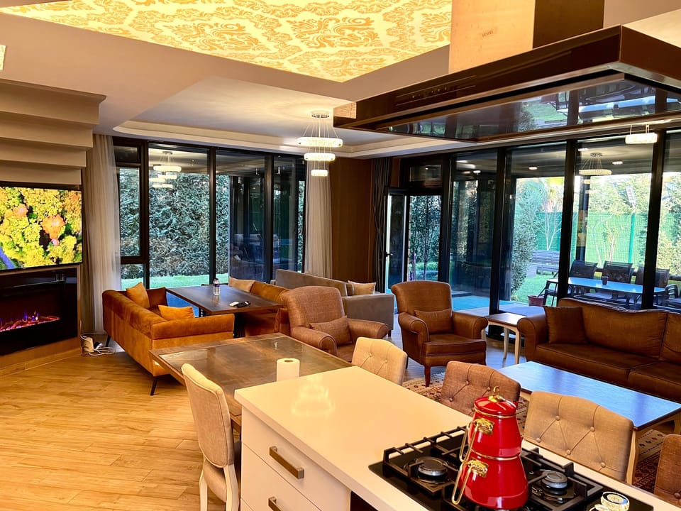 Exclusive Villa | Private kitchen | Coffee/tea maker, full-size fridge, microwave, oven